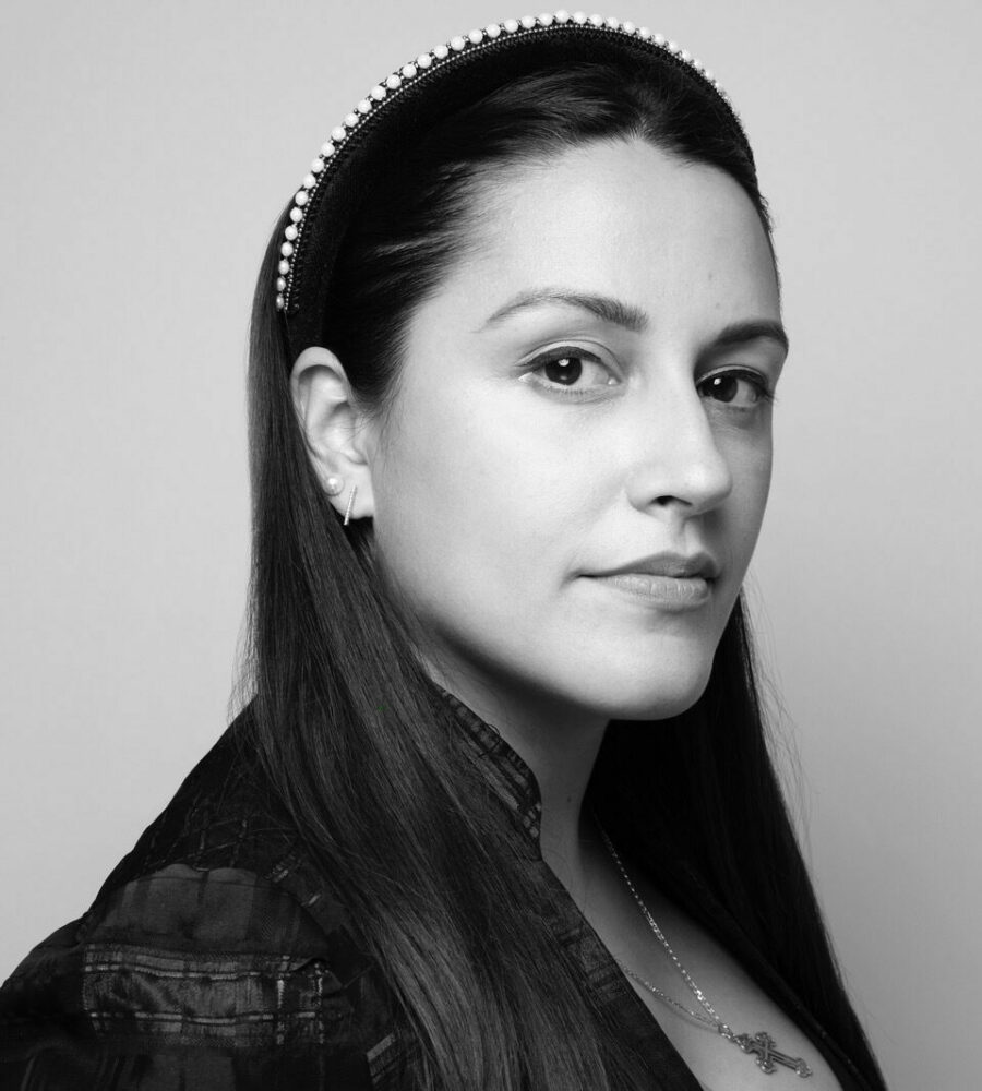 Black and white profile photo of Nina-Sophia Miralles