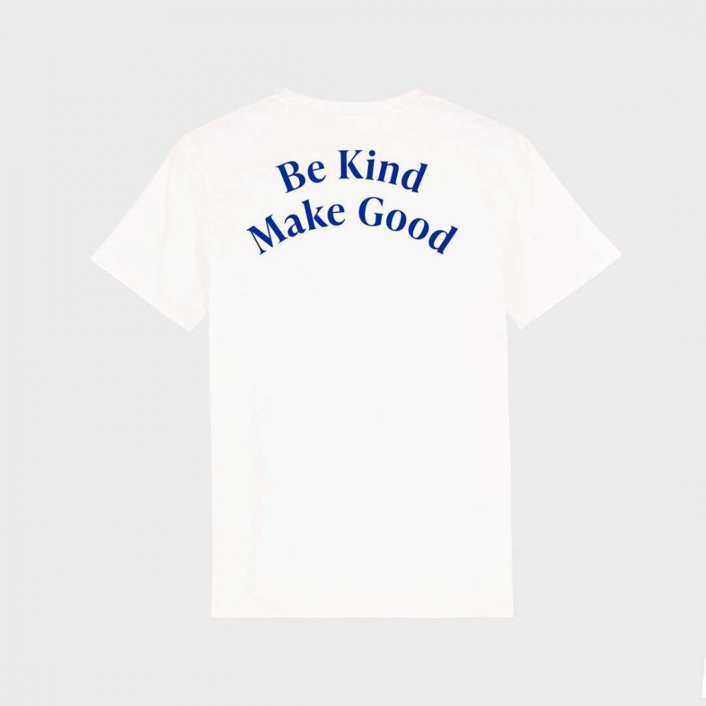 A white tshirt with blue text that reads be kind make good