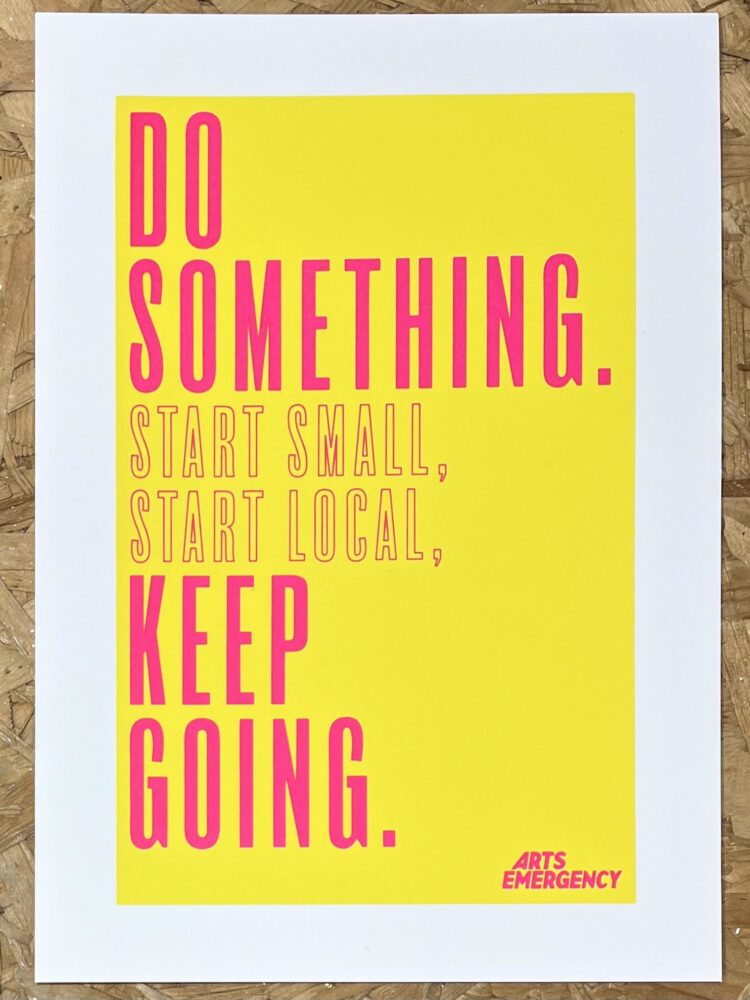 A yellow A4 page with bright pink text reading 'Do something. Start small, start local, keep going screen print.'