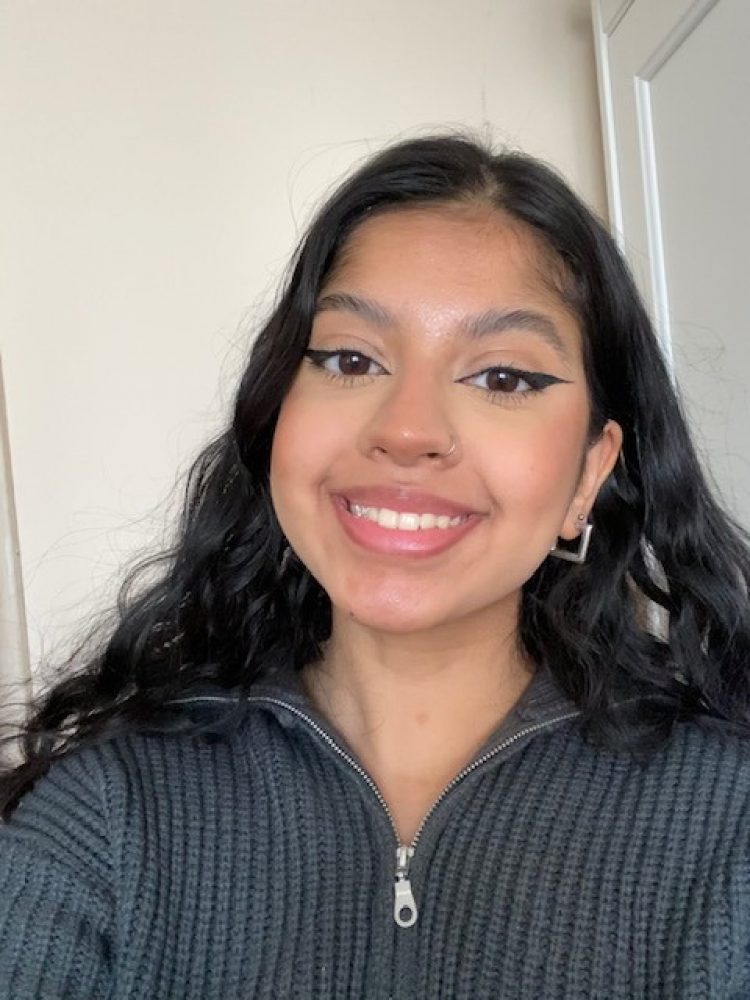 A head and shoulders view of a young woman